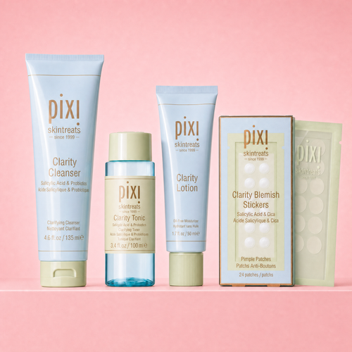Ultimate Clarity Bundle featuring Clarity Cleanser, Tonic, Lotion and Blemish Stickers on a pink background view 1