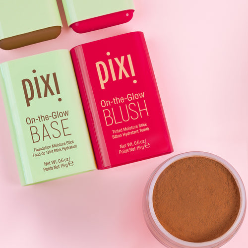 On-the-Glow BLUSH, On-the-Glow BASE, and H2O SkinVeil on a pink background