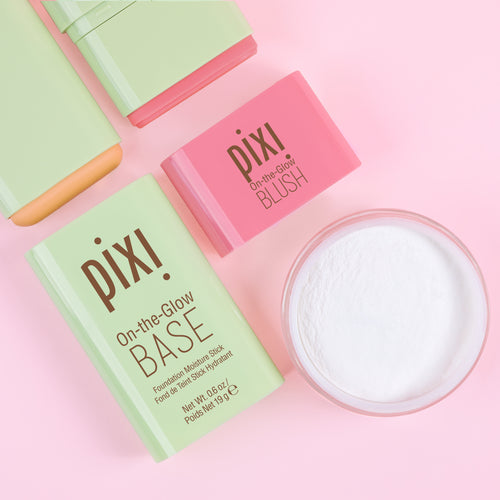 On-the-Glow BLUSH, On-the-Glow BASE, and H2O SkinVeil on a pink background