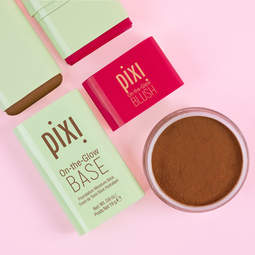 On-the-Glow BLUSH, On-the-Glow BASE, and H2O SkinVeil on a pink background