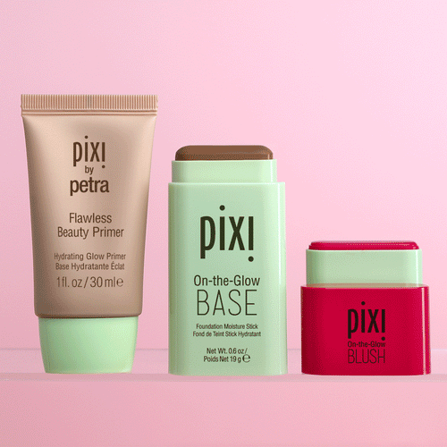 Flawless Beauty Primer, On-the-Glow BASE, and On-the-Glow Blush on a pink background