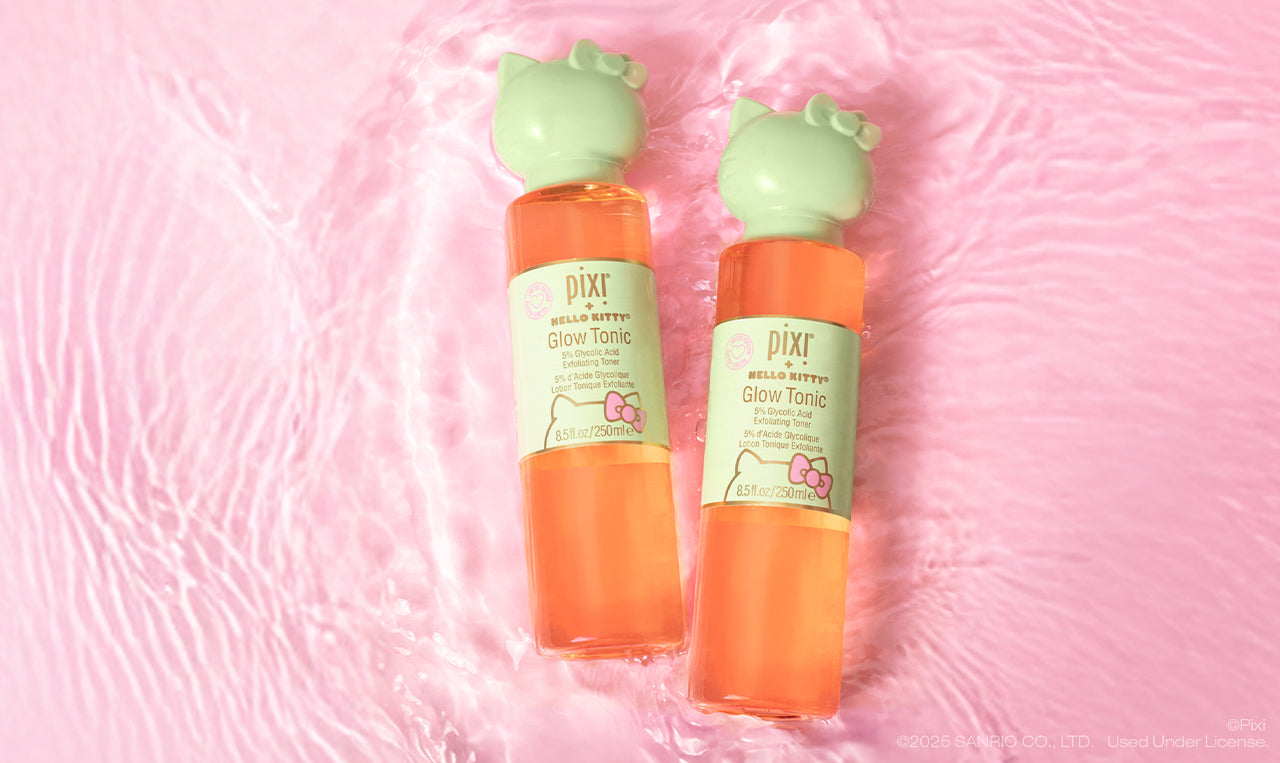 Pixi + Hello Kitty Glow Tonic Original Size shown on a pink background with water