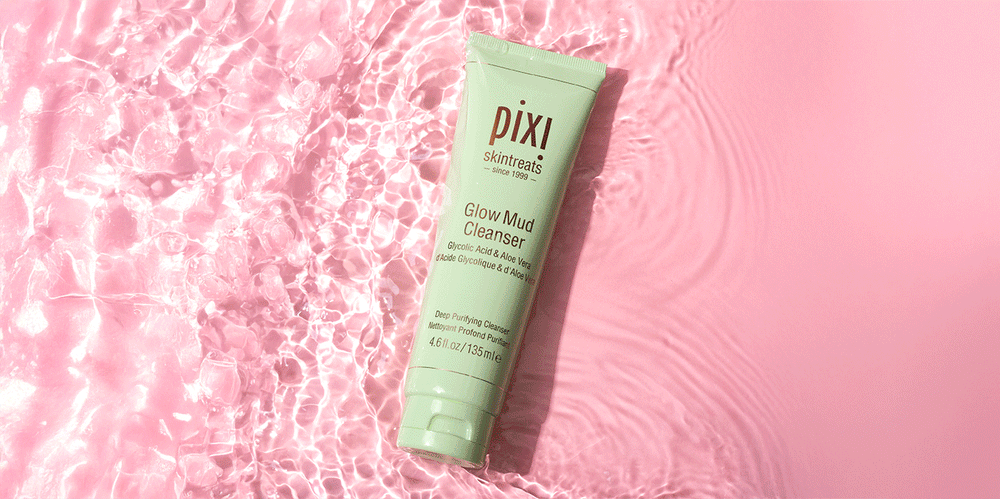 Rose Cream Cleanser, Clarity Cleanser and Glow Mud Cleanser shown with water