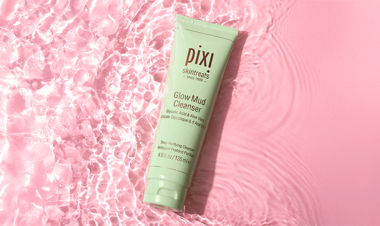 Rose Cream Cleanser, Clarity Cleanser and Glow Mud Cleanser shown with water