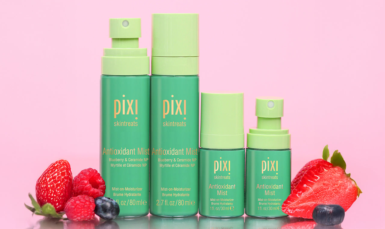 Antioxidant Mists in multiple sizes shown on a pink background with berries