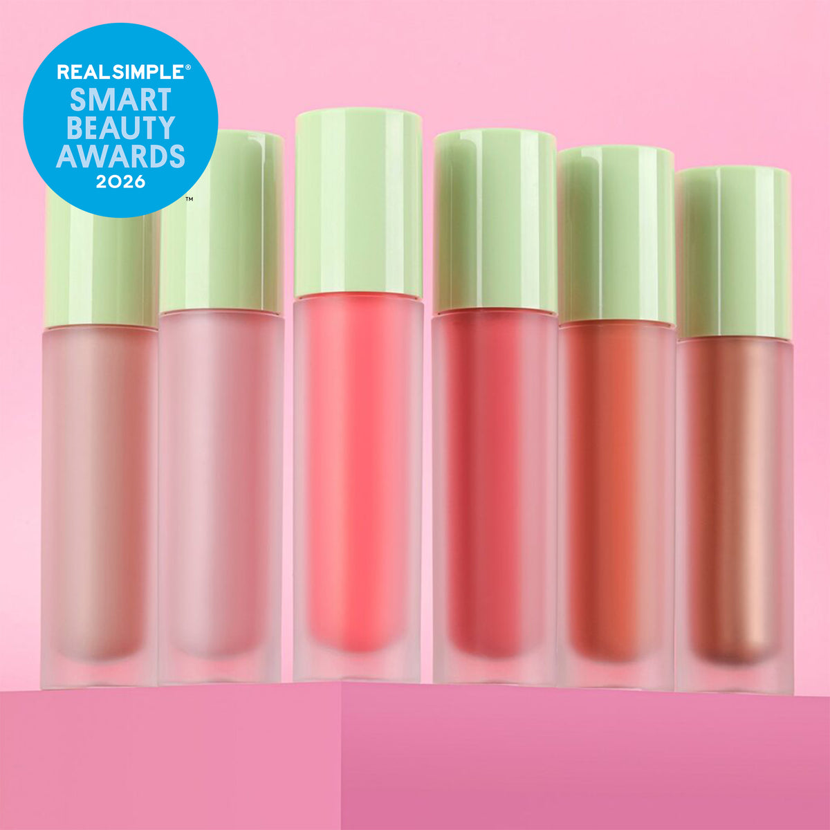 All shades of LiquidGlow Blush shown on a pink background with RealSimple Smart Beauty Awards 2026 sticker