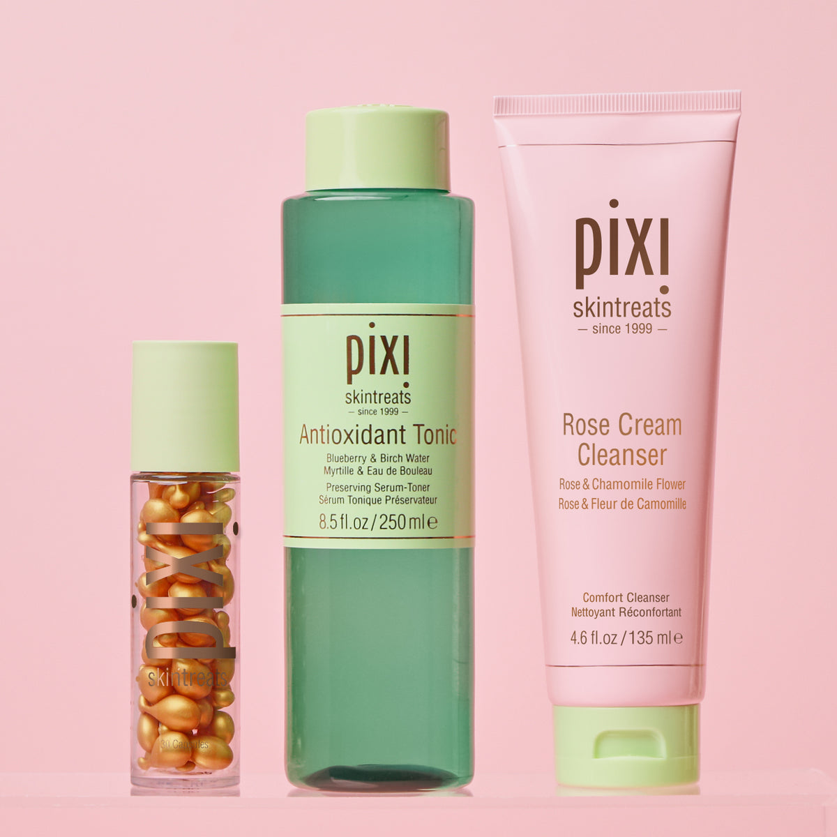 Antioxidant Trio bundle on a pink background