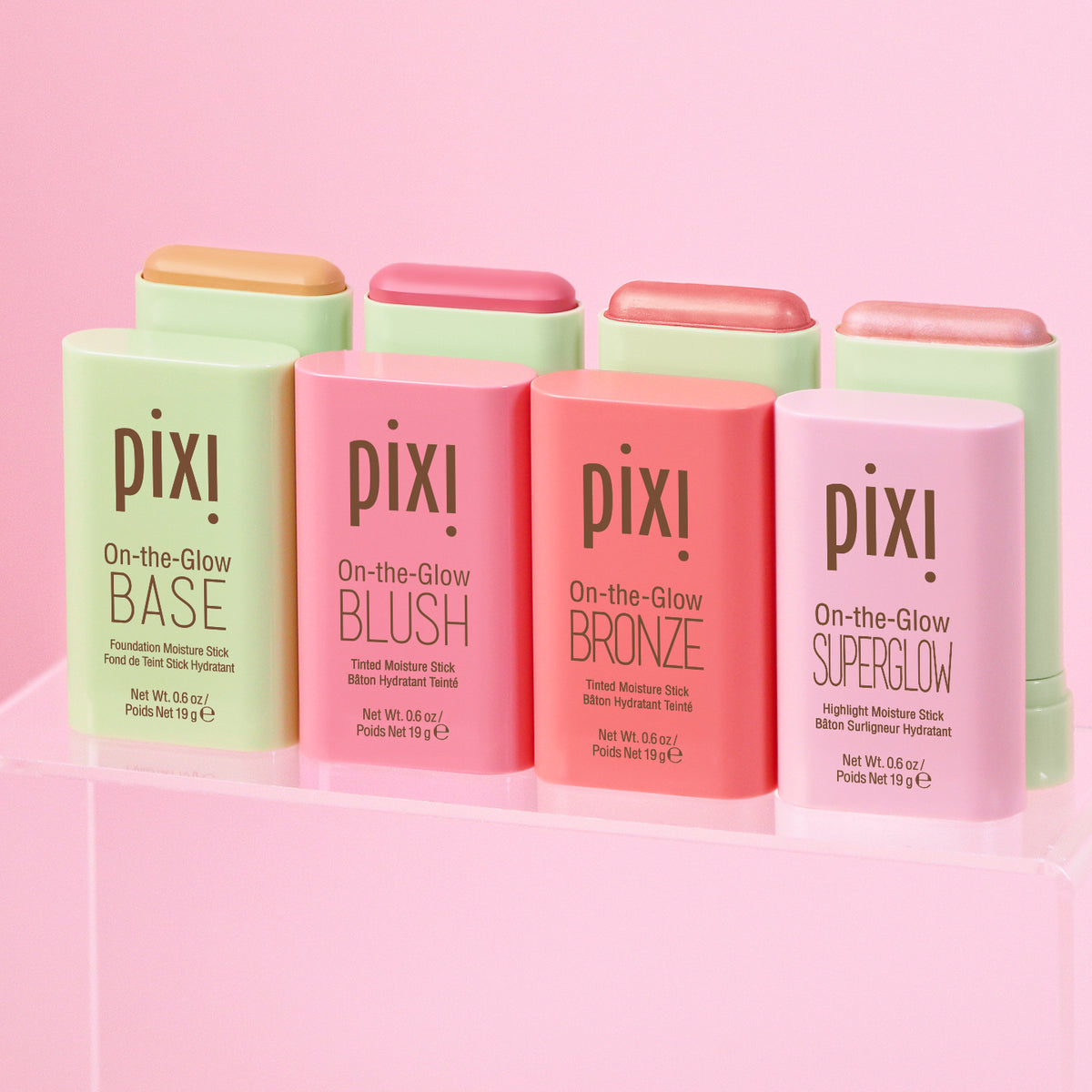 Petra's Complete Glow Bundle on a pink background
