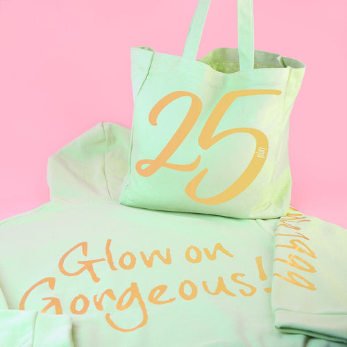Pixi Anniversary Tote and Hoodie view 1