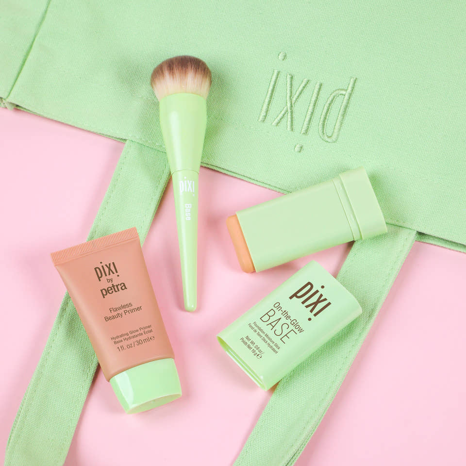 Pixi Travel Tote with select products showing. view 2