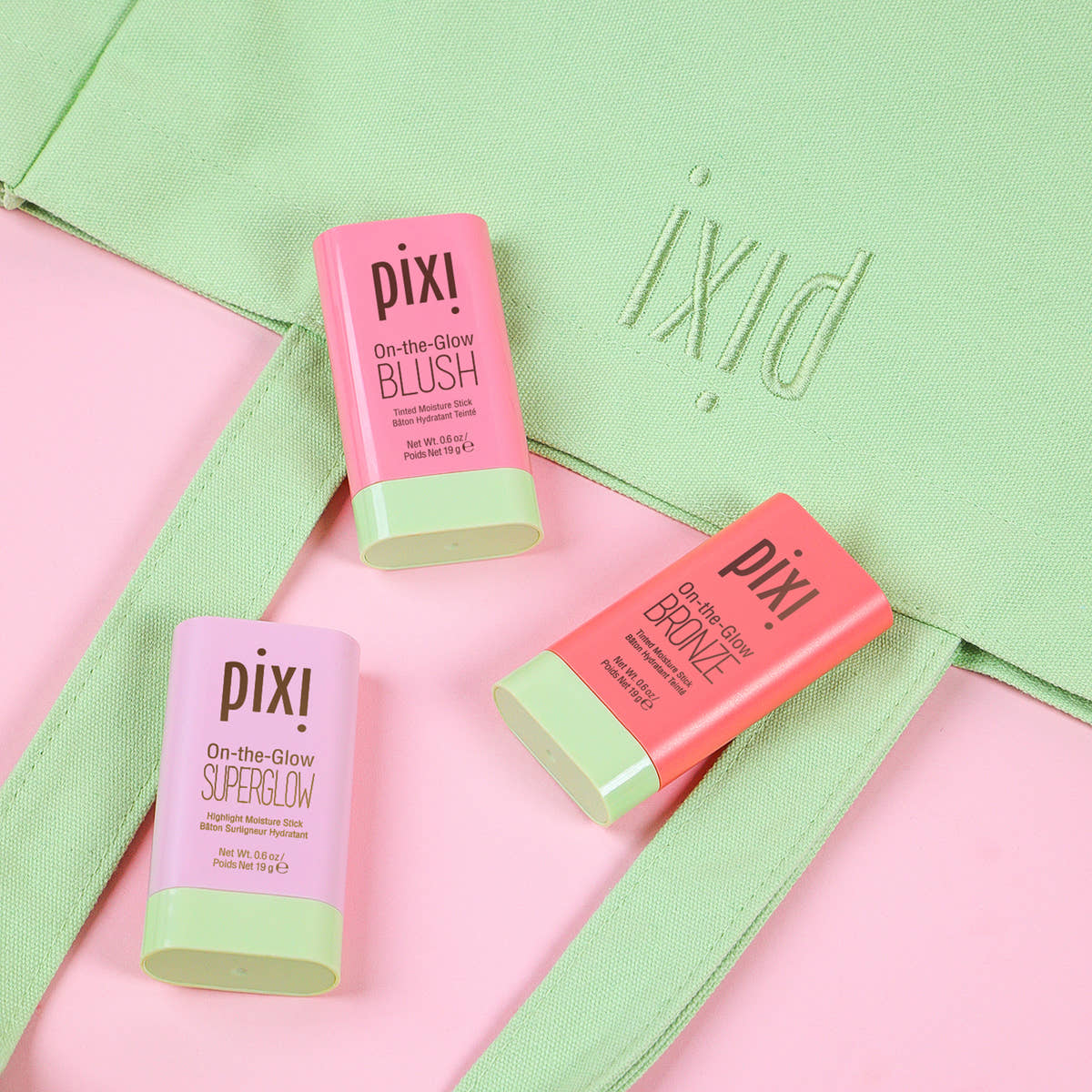Pixi Travel Tote with products included as examples.