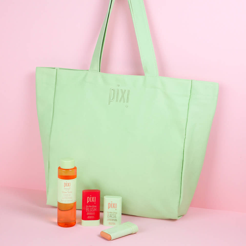 Pixi Travel Tote with products included. view 1