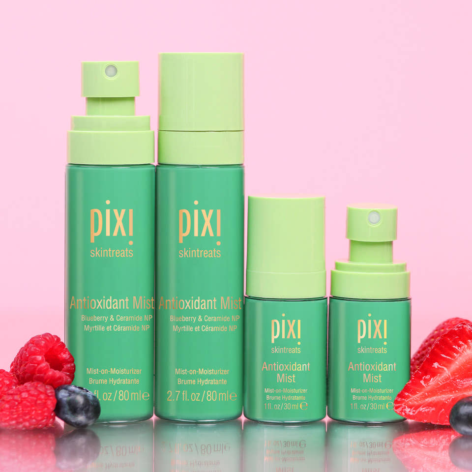 Antioxidant Mists in multiple sizes shown on a pink background with berries - view 1 view 1