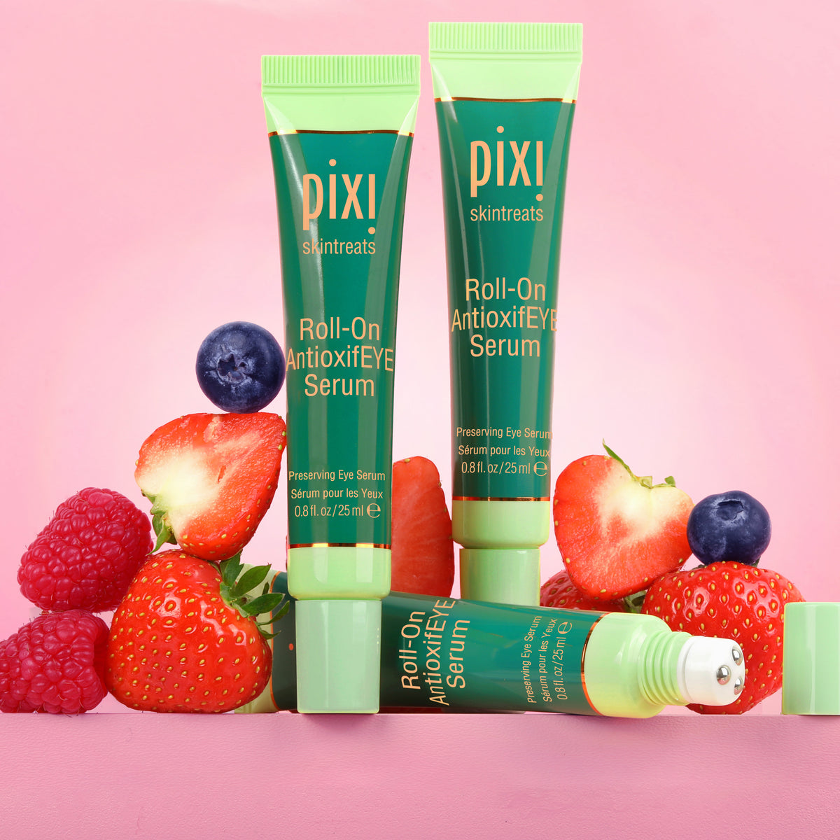 Roll-on AntioxifEYE Serum - three products with antioxidant rich fruit in background of image.