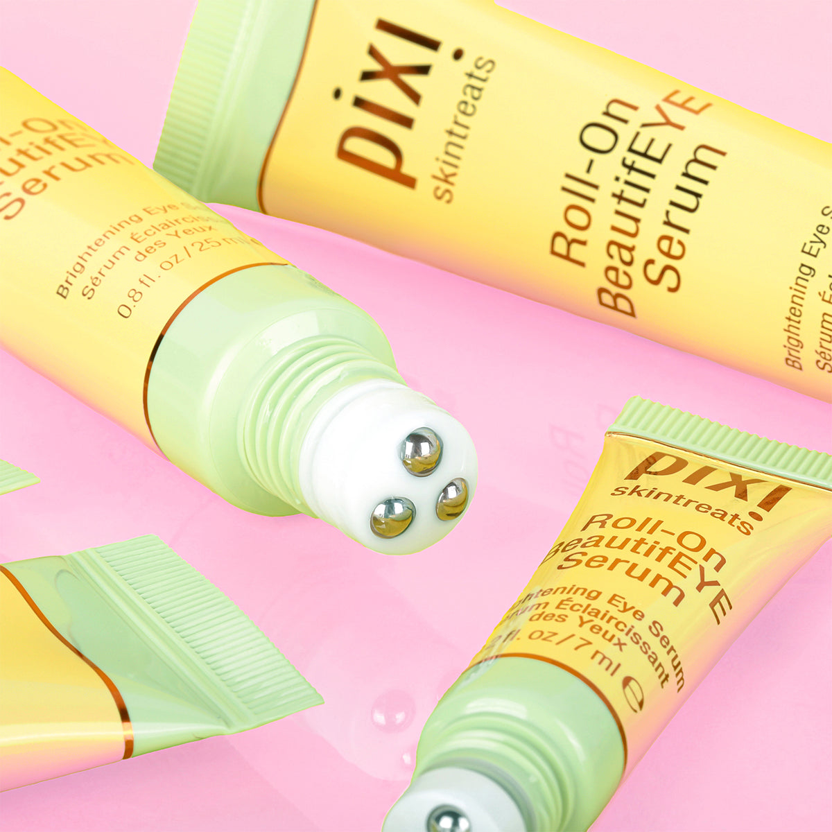 Roll-On BeautifEYE Serum close up of rollerball feature on a pink background.