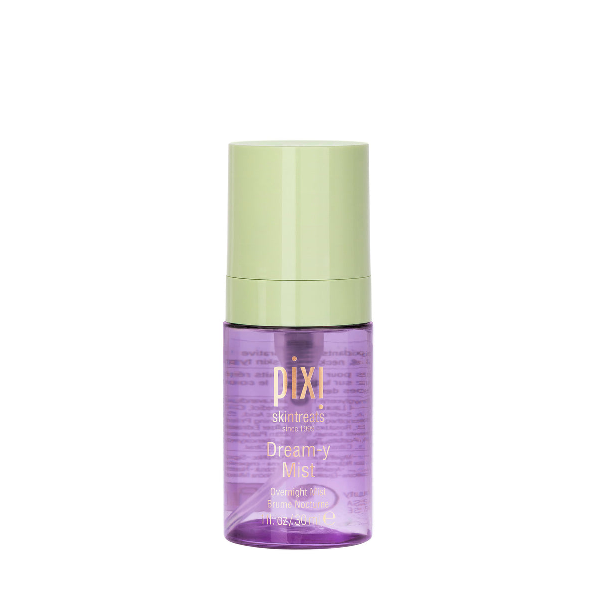 A bottle of Pixi SkinTreats Dreamy Mist on a solid white background. The bottle is translucent purple with a light green cap.