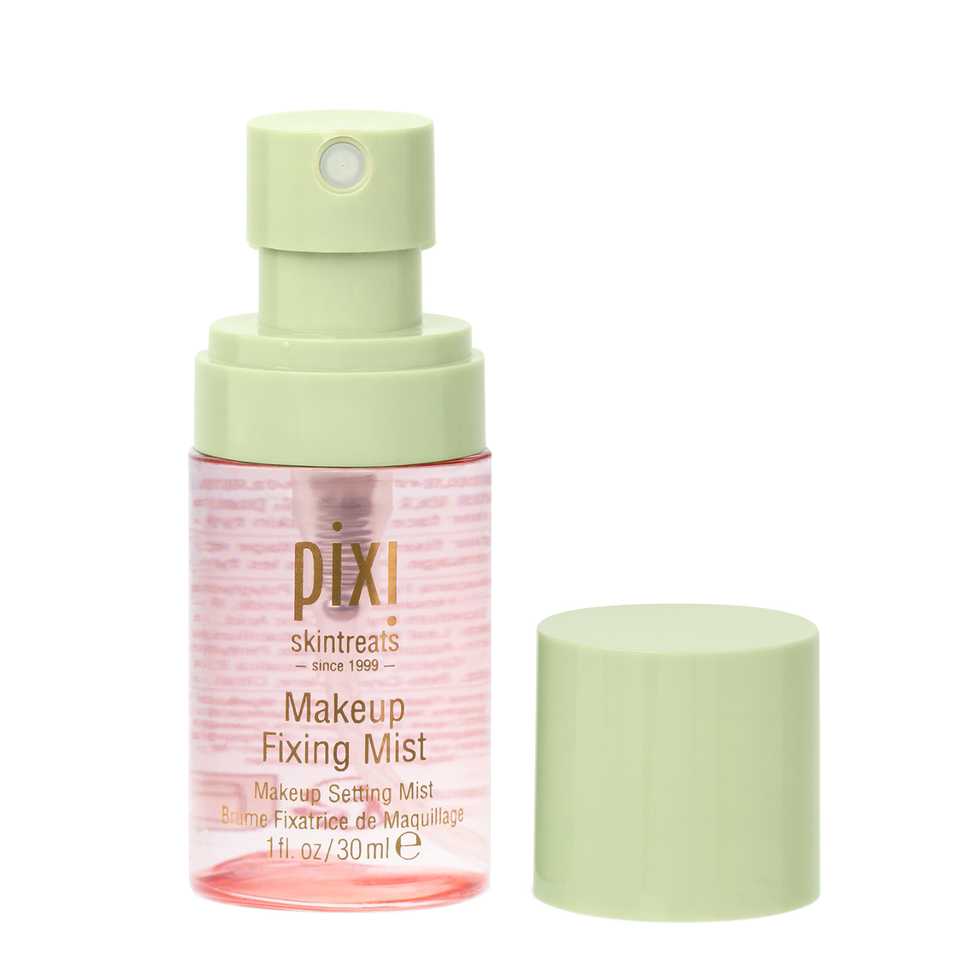 Pixi Makeup Fixing mist makeup setting spray in mini size on white background with cap off. view 2
