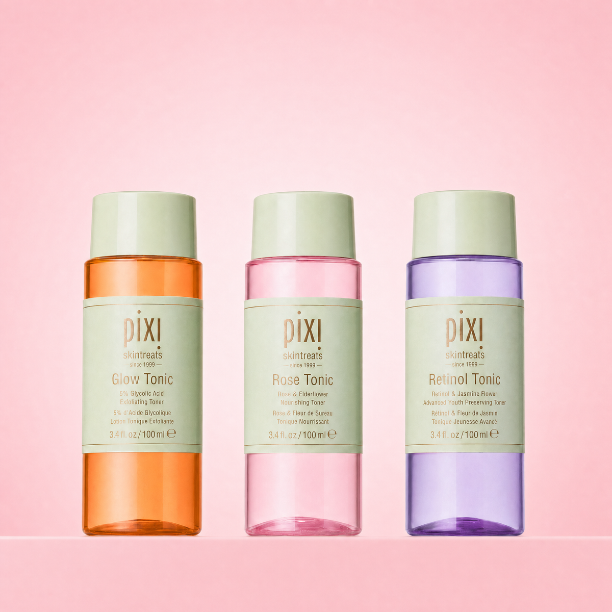 Essential Tonic Trio shown on a pink background featuring Glow Tonic, Rose Tonic and Retinol Tonic